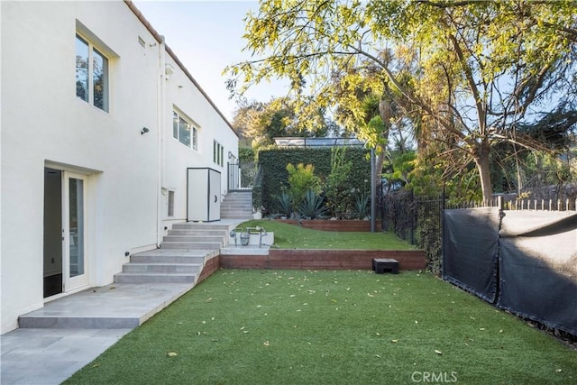 view of yard with fence