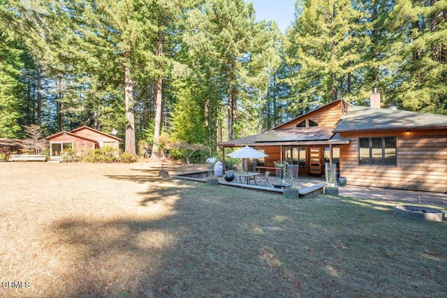 view of yard with a deck