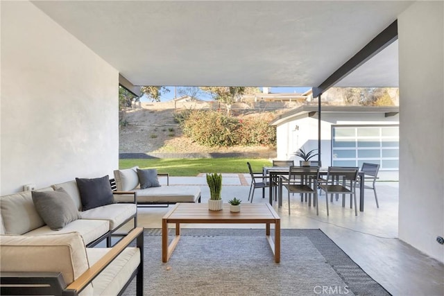 view of patio with outdoor dining space and outdoor lounge area