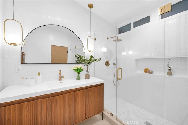 full bath featuring a shower stall and vanity