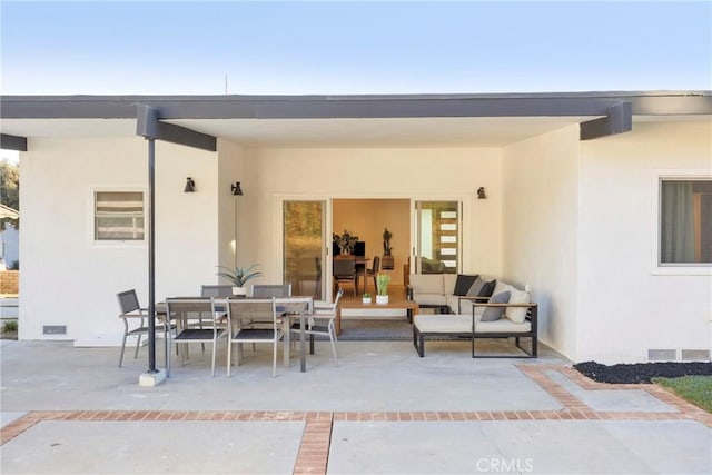 view of patio / terrace with visible vents, outdoor dining space, and outdoor lounge area