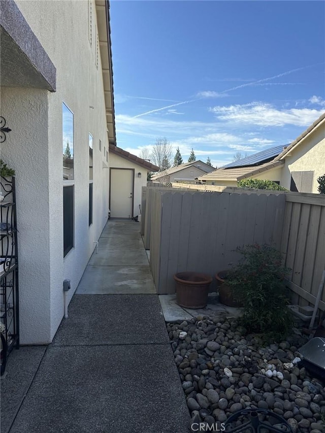 exterior space with a patio area and fence