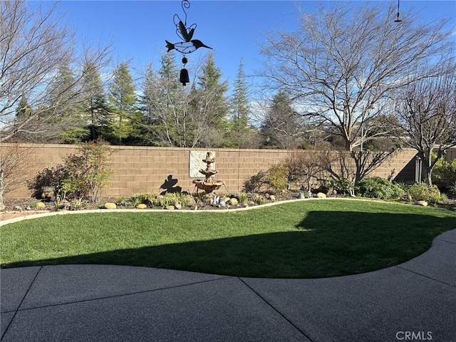 view of yard with fence