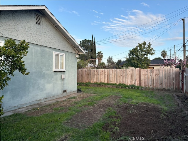 view of yard with fence