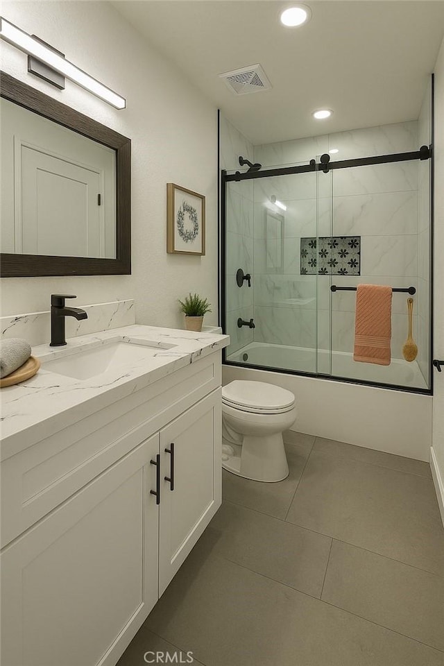 9100 Acacia Ave Unit 9, Fontana, CA 92335 - bathroom featuring vanity, toilet, enclosed tub / shower combo, recessed lighting, and tile patterned flooring