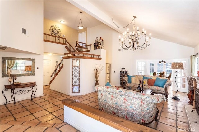 living area featuring visible vents, high vaulted ceiling, a chandelier, and stairs