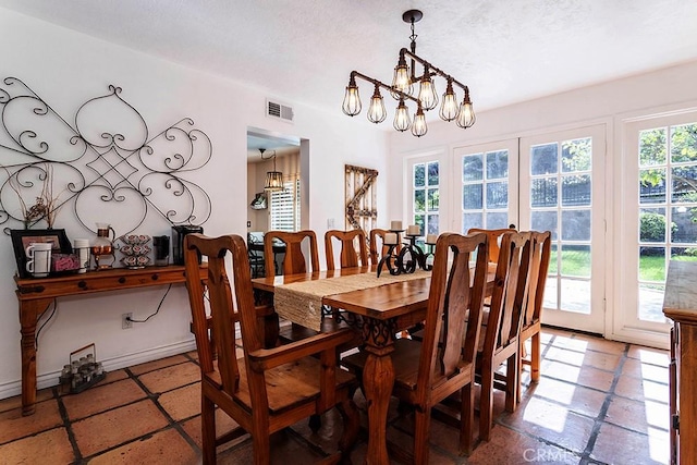 23461 Darcy Ln, Newhall, CA 91321 - dining space featuring a chandelier