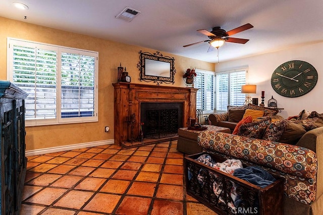 23461 Darcy Ln, Newhall, CA 91321 - living area with a fireplace, a ceiling fan, and baseboards