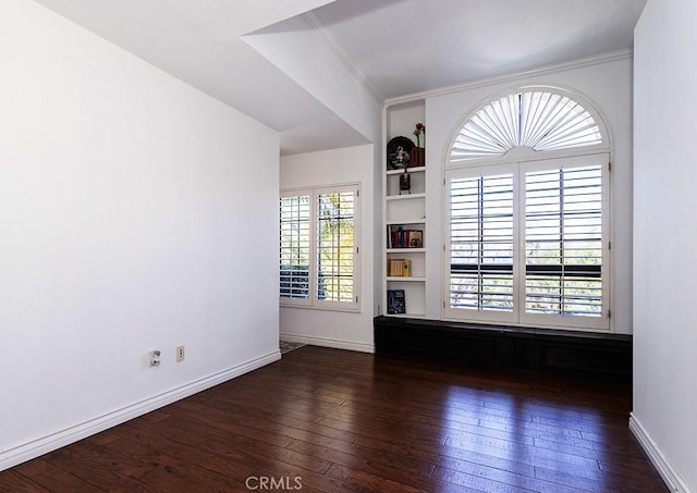 23461 Darcy Ln, Newhall, CA 91321 - unfurnished room featuring crown molding, dark wood-style flooring, and baseboards