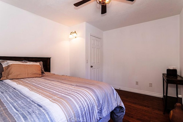 23461 Darcy Ln, Newhall, CA 91321 - bedroom with wood finished floors, baseboards, and ceiling fan