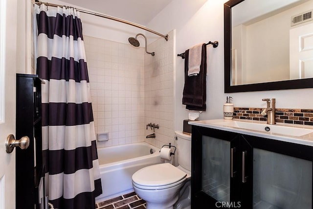 23461 Darcy Ln, Newhall, CA 91321 - full bathroom with toilet, decorative backsplash, shower / bath combination with curtain, and vanity