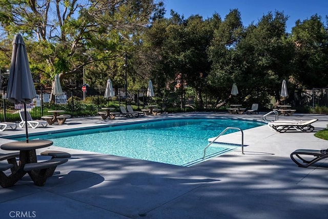 23461 Darcy Ln, Newhall, CA 91321 - community pool with a patio and view of wooded area