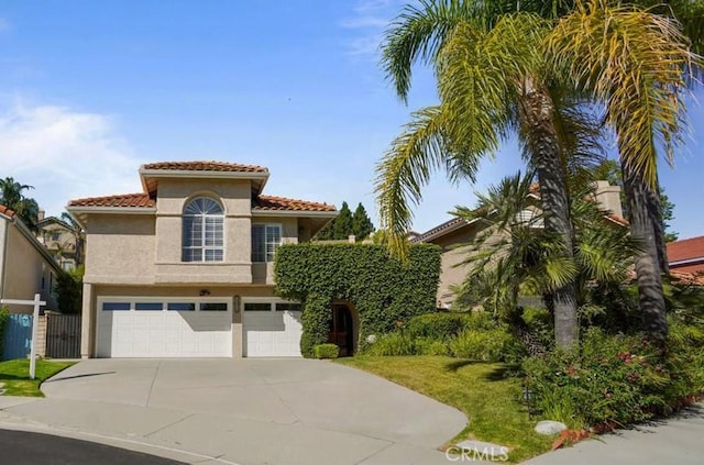 23461 Darcy Ln, Newhall, CA 91321 - mediterranean / spanish home with concrete driveway, stucco siding, an attached garage, a tiled roof, and a front lawn