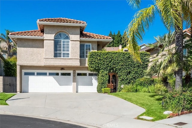 23461 Darcy Ln, Newhall, CA 91321 - mediterranean / spanish home featuring stucco siding, a tiled roof, and driveway