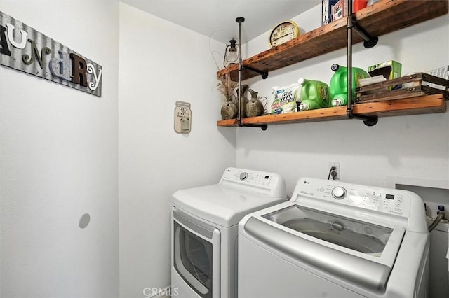23461 Darcy Ln, Newhall, CA 91321 - washroom with washing machine and clothes dryer