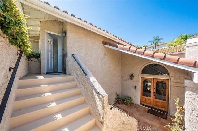 23461 Darcy Ln, Newhall, CA 91321 - entrance to property with french doors and stucco siding