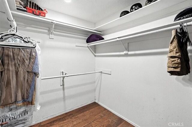 23461 Darcy Ln, Newhall, CA 91321 - spacious closet featuring dark wood finished floors