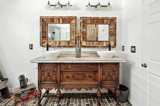 23461 Darcy Ln, Newhall, CA 91321 - bathroom view of double vanity and baseboards