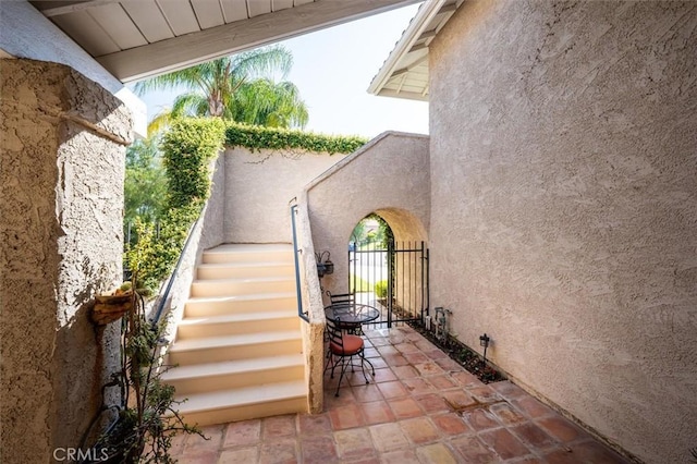 23461 Darcy Ln, Newhall, CA 91321 - view of patio with stairway and a gate