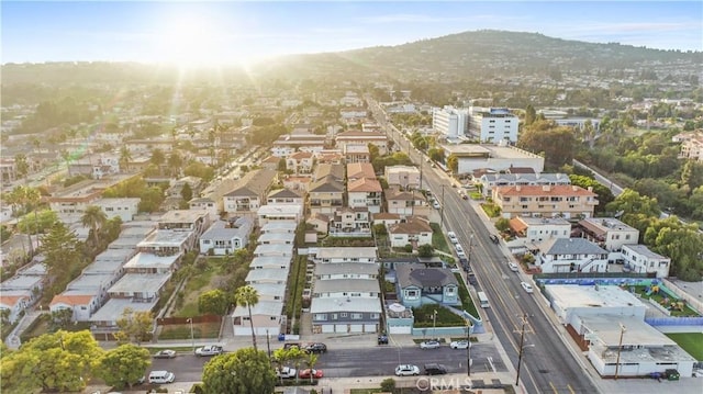 drone / aerial view featuring a mountain view and a residential view