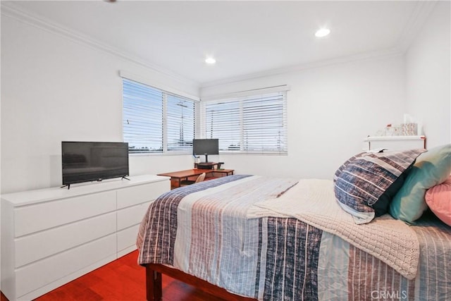 bedroom with recessed lighting, ornamental molding, and wood finished floors