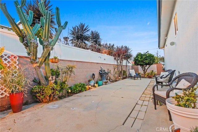 view of patio featuring a fenced backyard