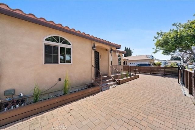 view of patio with fence