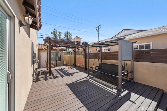 wooden terrace featuring a pergola