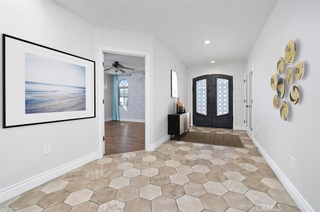 entryway with baseboards, ceiling fan, light tile patterned floors, recessed lighting, and french doors