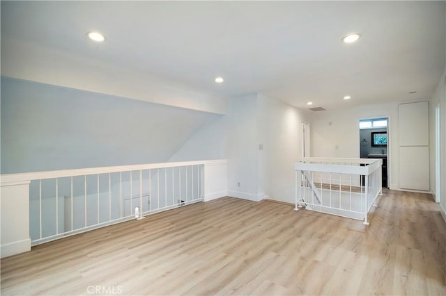 unfurnished room featuring recessed lighting and light wood-style flooring