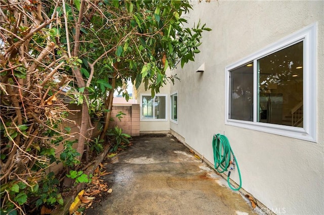 view of patio featuring fence