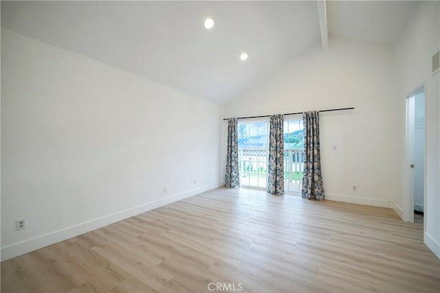 empty room with light wood-type flooring, beam ceiling, high vaulted ceiling, and baseboards