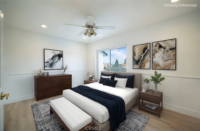 bedroom featuring recessed lighting, baseboards, a ceiling fan, and light wood finished floors