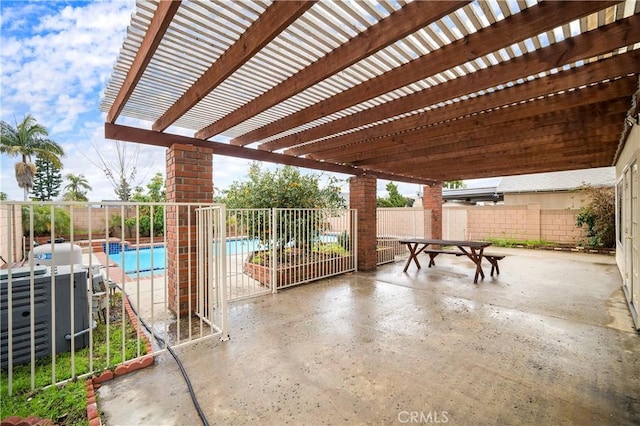 view of patio / terrace with a fenced in pool, fence, and a pergola