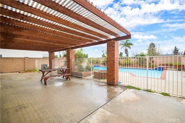 view of patio / terrace with a fenced in pool, a pergola, and fence