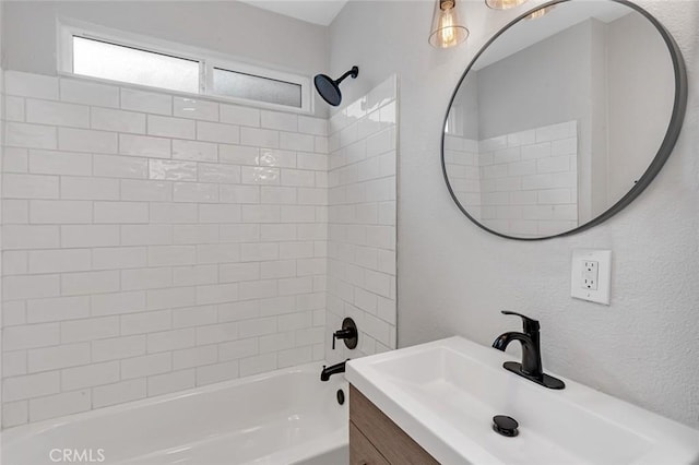 bathroom with vanity and bathing tub / shower combination