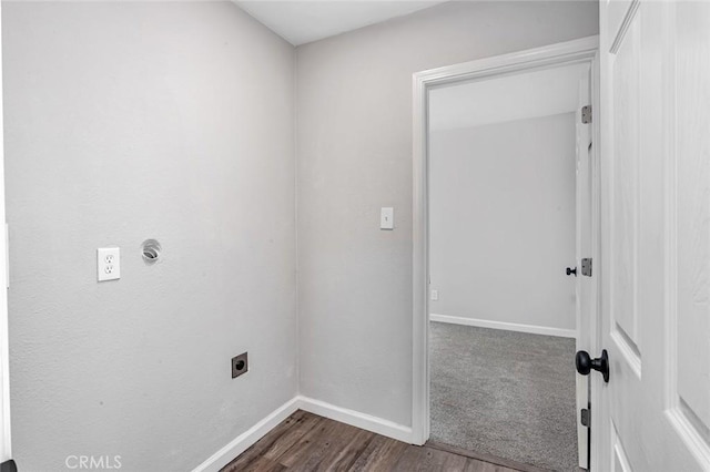 laundry area featuring baseboards, dark wood-style floors, laundry area, and electric dryer hookup