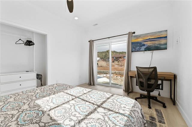 bedroom featuring visible vents, access to outside, light wood finished floors, baseboards, and ceiling fan