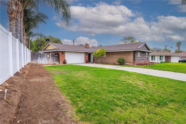 single story home featuring fence, concrete driveway, a front yard, a chimney, and a garage