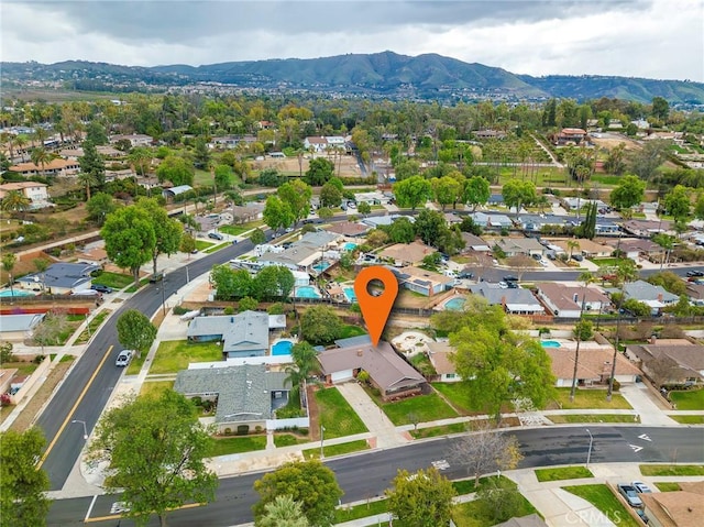 bird's eye view featuring a mountain view and a residential view