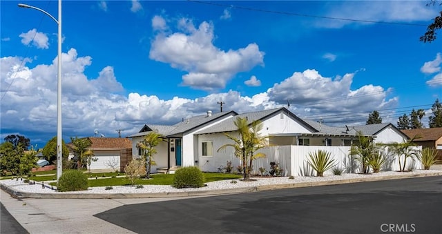 view of front of property with fence