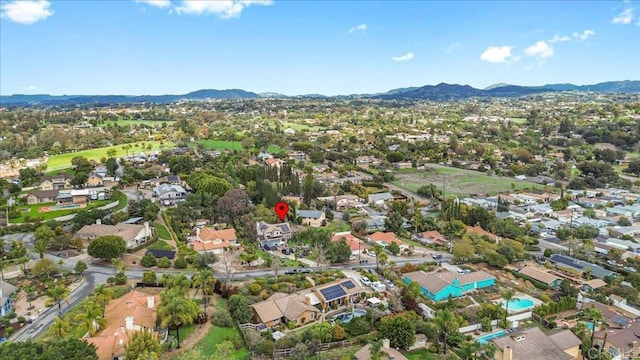 bird's eye view featuring a residential view and a mountain view