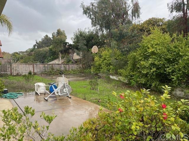 view of patio with fence