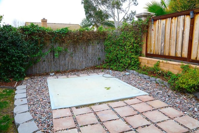 view of patio featuring a fenced backyard