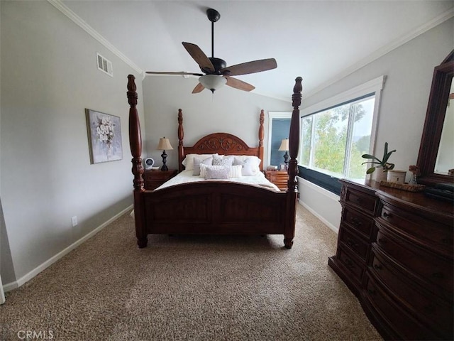 bedroom featuring a ceiling fan, baseboards, visible vents, crown molding, and carpet flooring