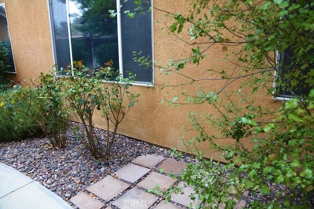 exterior details with stucco siding