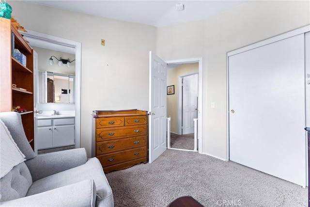 sitting room featuring carpet floors