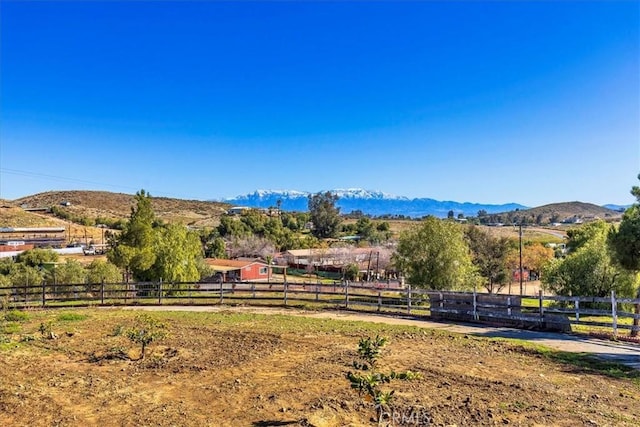 view of mountain feature with a rural view