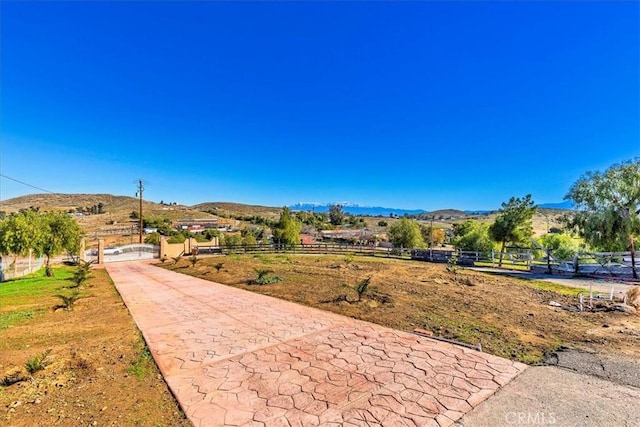 property view of mountains with a rural view