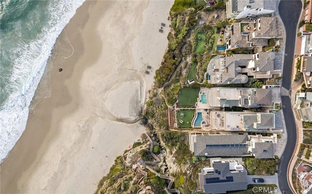 bird's eye view with a water view and a residential view